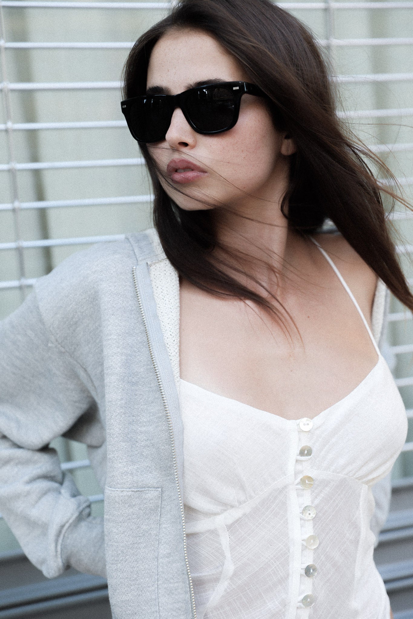 Women’s white ethereal tank top in upcycled cotton with pearl buttons and adjustable straps
