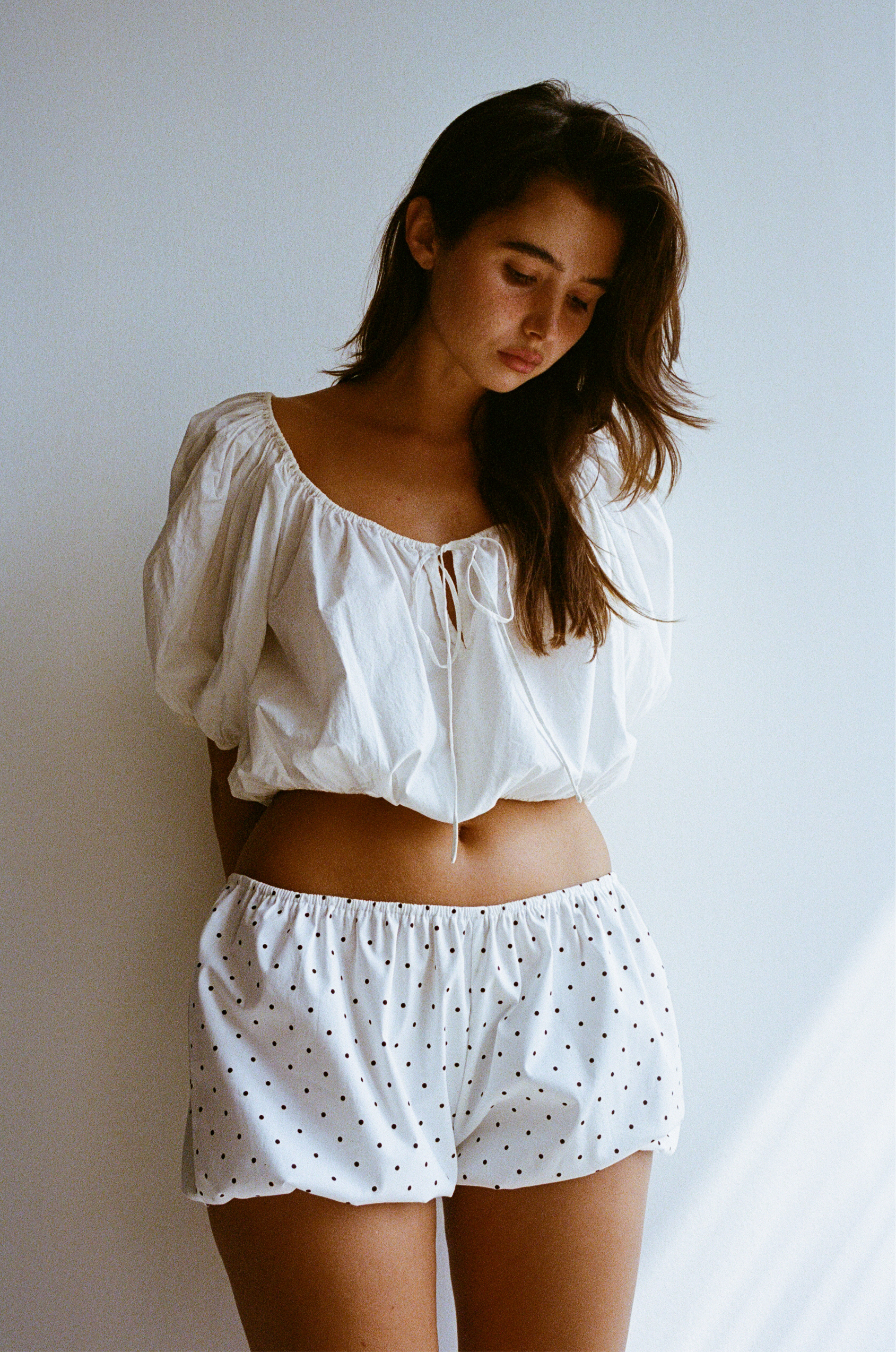 White babydoll bloomers with black polka dots made with upcycled deadstock cotton, soft women’s lounge shorts