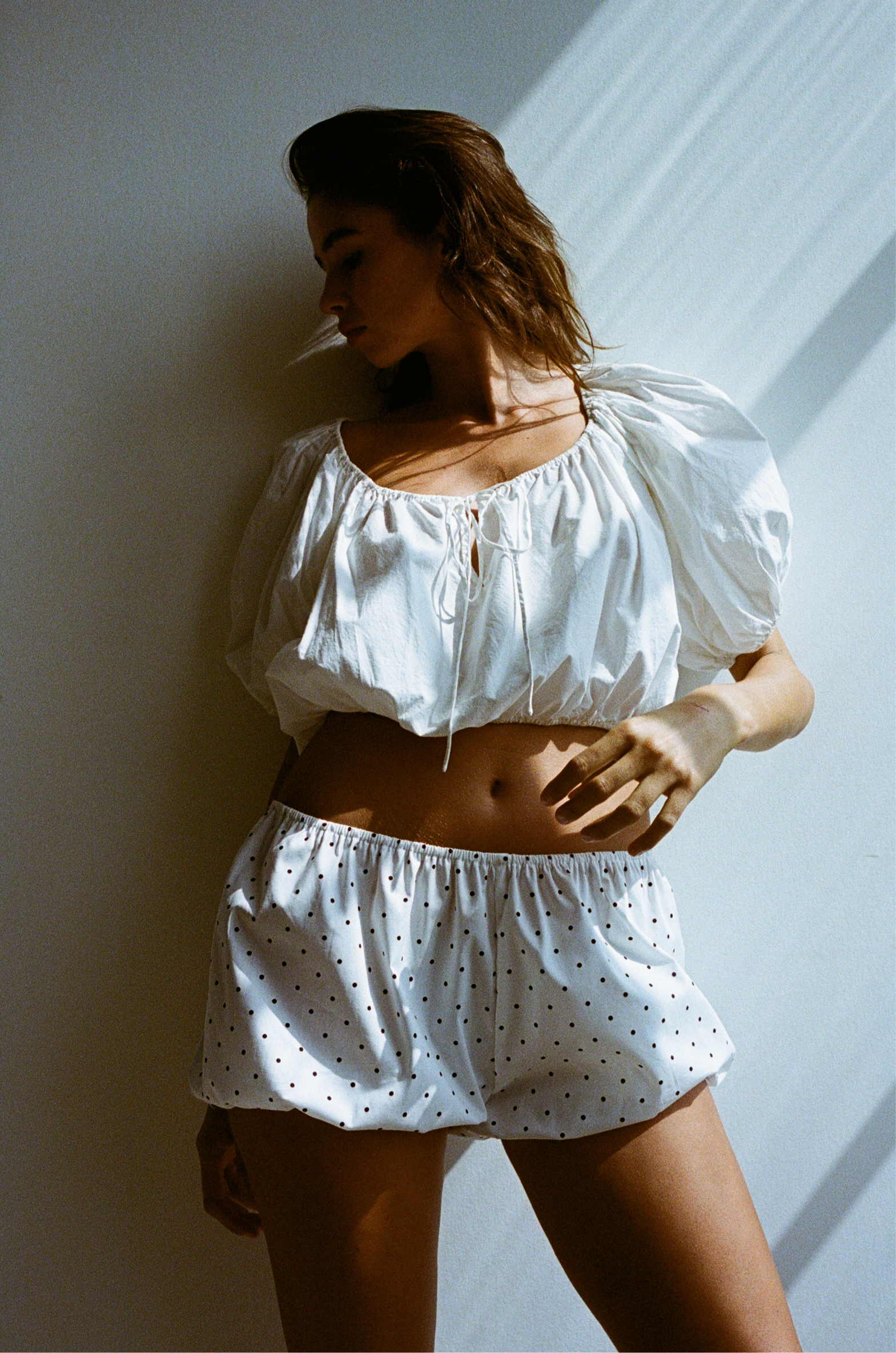 White babydoll bloomers with black polka dots made with upcycled deadstock cotton, soft women’s lounge shorts