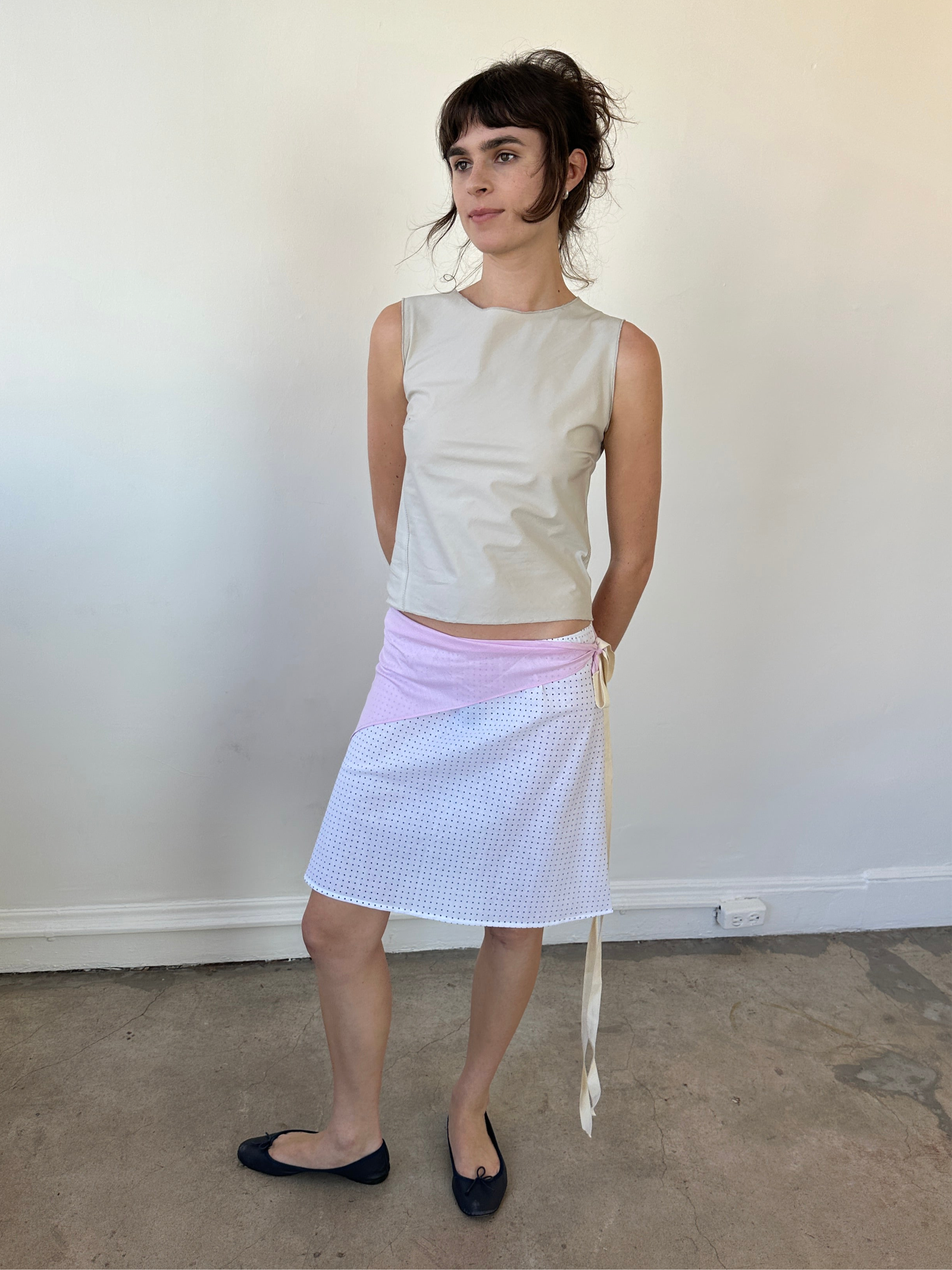 Navy polka dot cotton mini skirt with elastic waist made from upcycled fabric