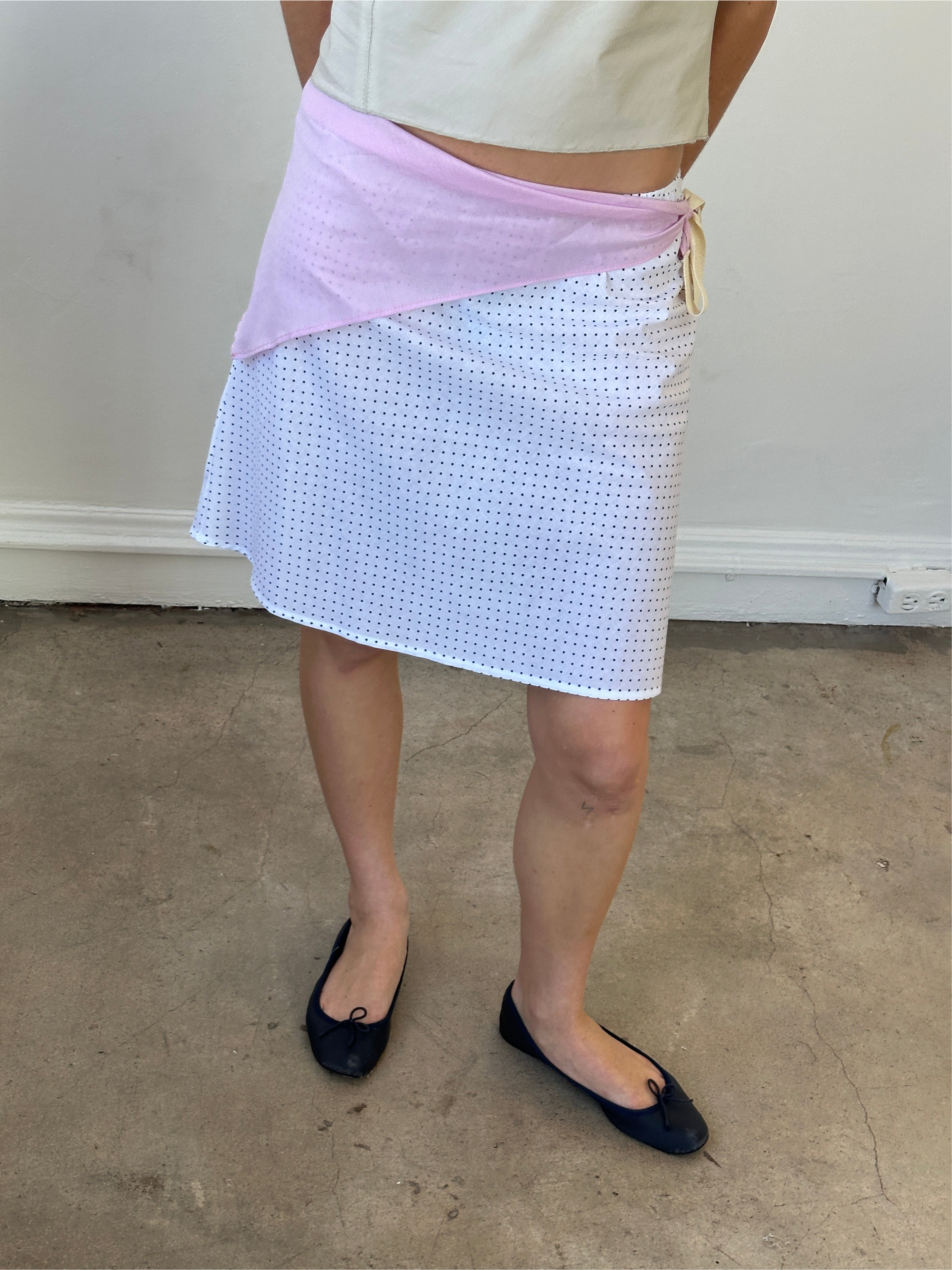 Navy polka dot cotton mini skirt with elastic waist made from upcycled fabric