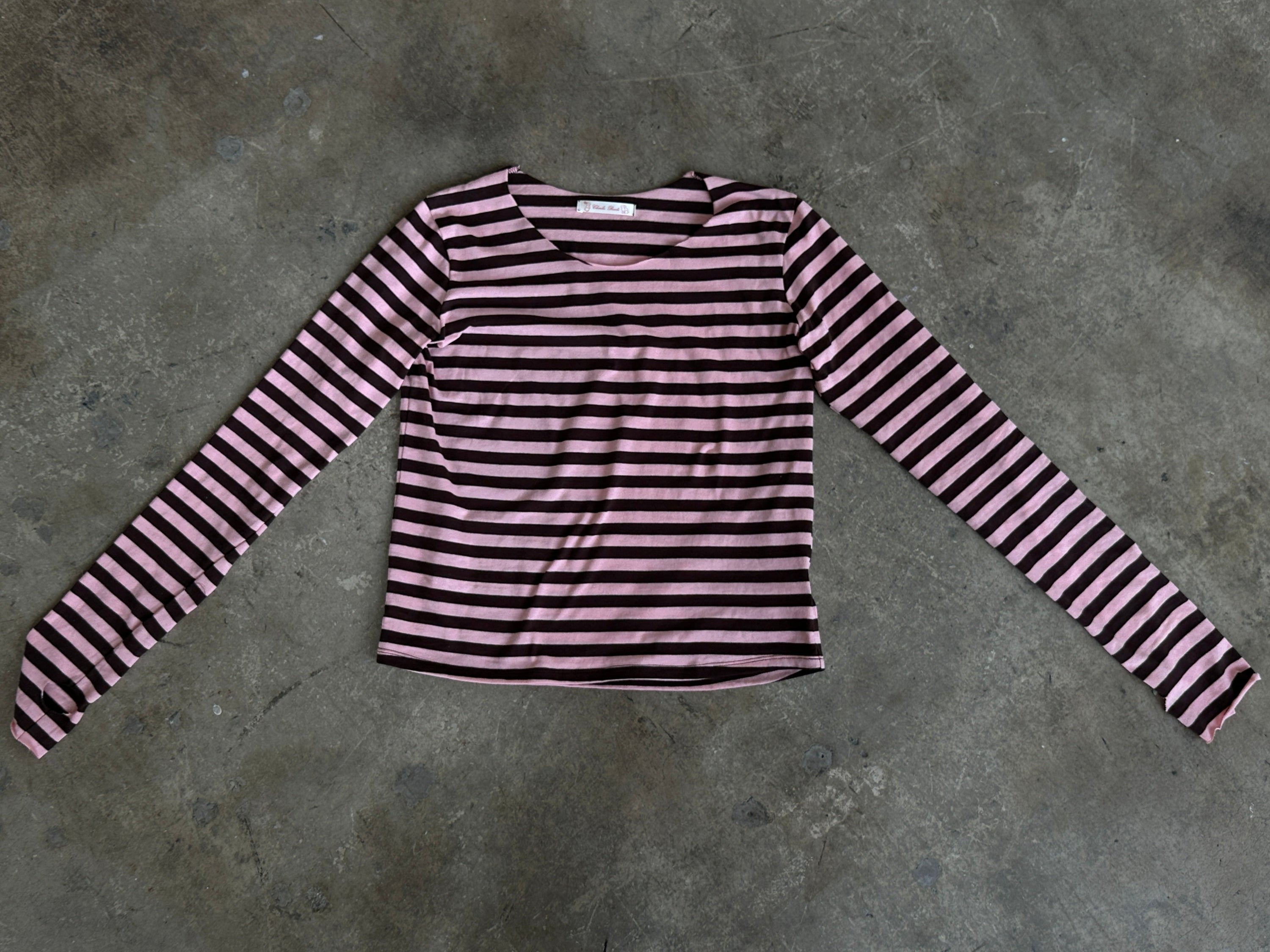 Jaden Long Sleeve Tee in pink brown stripes with raw sleeve and neckline, thumbholes, made from upcycled cotton